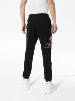 Versace pantalon de jogging à logo imprimé