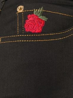 Versace jean skinny à fleurs brodées
