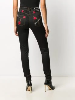 Versace jean skinny à fleurs brodées