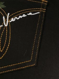 Versace jean skinny à fleurs brodées