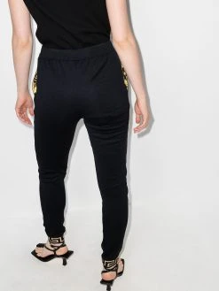Versace pantalon de jogging à bandes Greca