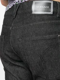 Versace jean droit à détails graphiques