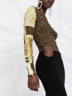 Versace jupe mi-longue à découpe