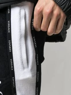 Versace pantalon de jogging à imprimé à rayures