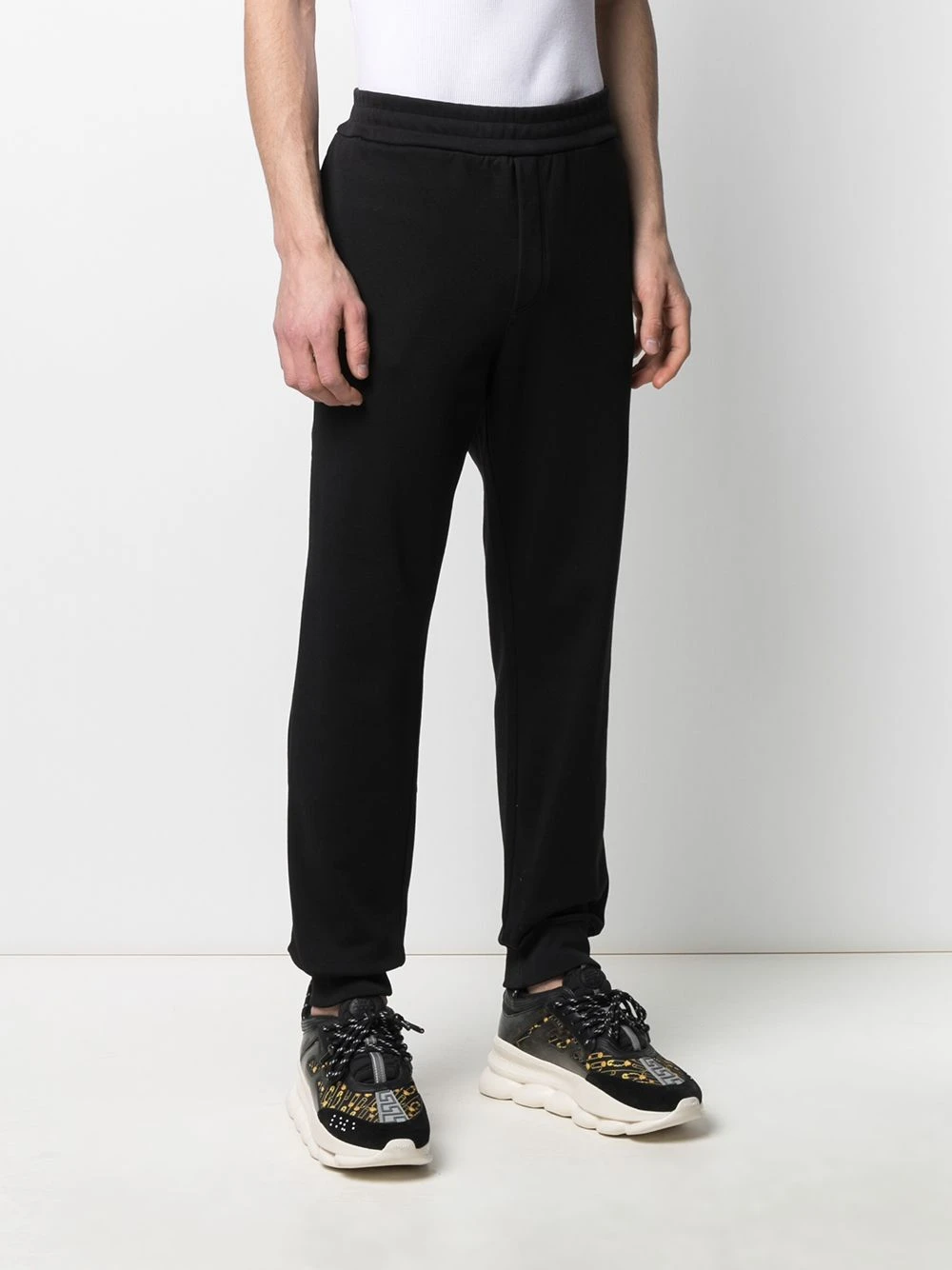 Prix d’Amis Versace Pantalon de jogging à patch logo pantalons de survêtement homme 6 Versace pantalon de jogging à patch logo
