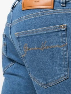 Versace jean droit à effet légèrement délavé