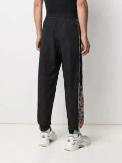 Versace Meilleur Prix Garanti Pantalon de jogging à imprimé graphique pantalons de survêtement homme 12 Versace pantalon de jogging à imprimé graphique