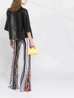 Versace pantalon évasé à imprimé graphique