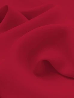 Versace jupe mi-longue drapée à design asymétrique