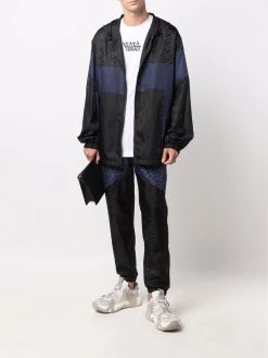 Versace pantalon de jogging à logo imprimé