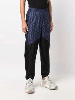 Versace pantalon de jogging à logo imprimé