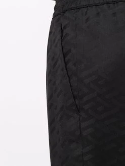Versace pantalon en satin à logo brodé