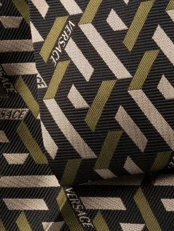 Versace pantalon à motif monogrammé