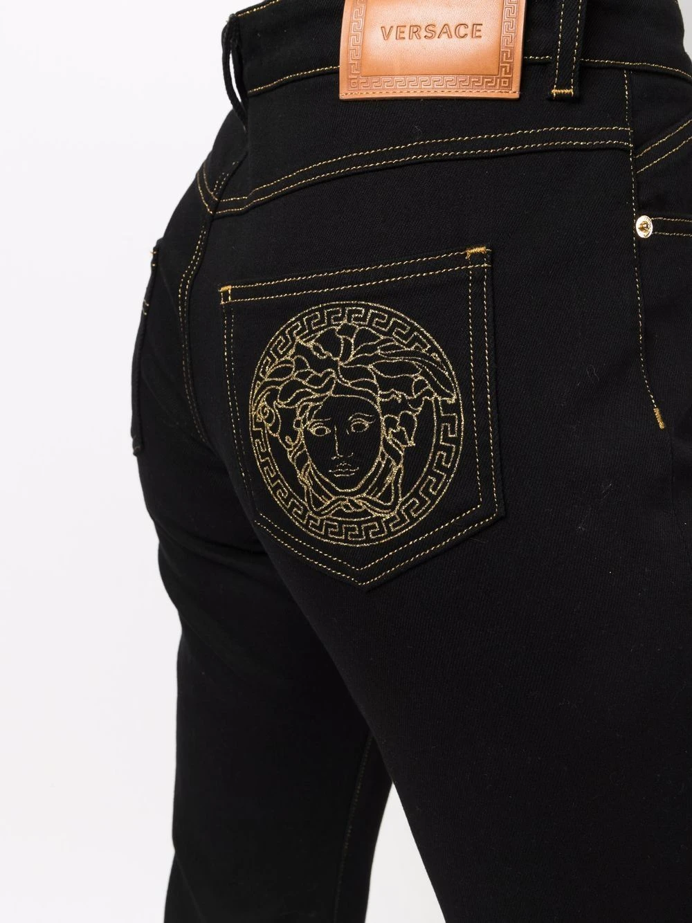 Versace Prix Incroyables Jean évasé à motif Medusa pantalons évasés femme 7 Versace jean évasé à motif Medusa