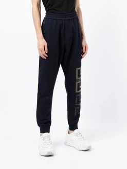 Versace pantalon de jogging à imprimé Greca