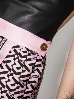 Versace minijupe plissée à imprimé La Greca
