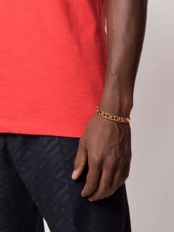 Versace bracelet torque à détail Greca