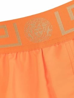 Versace short de bain à détail Greca