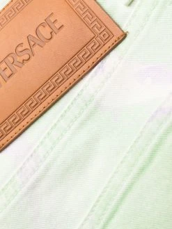 Versace jean droit à motif tie dye