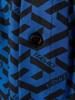 Versace pantalon de pyjama en coton à imprimé géométrique