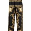 Prix Équitable Versace Bas de pyjama en soie à imprimé baroque vêtements de nuit homme 1 Versace bas de pyjama en soie à imprimé baroque