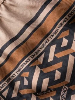 Versace pantalon droit à imprimé géométrique