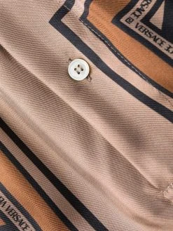 Versace pantalon droit à imprimé géométrique