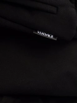 Versace pantalon de jogging à logo imprimé